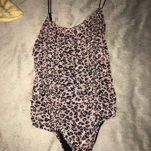 Cheetah print, pink and black body suit!